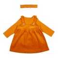 Mustard color babygirl sundress with t-shirt and headband isolated