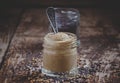 Mustard in a glass jar and seeds black and yellow mustard on an Royalty Free Stock Photo