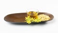 mustard oil, seed paste and flower on dish white blank space. Royalty Free Stock Photo