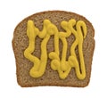 Mustard on a piece of wheat bread Royalty Free Stock Photo
