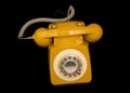 Mustard retro style telephone Royalty Free Stock Photo
