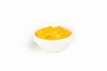 Mustard sauce in a bowl on a white plate. For the restaurant menu. Traditional Japanese sushi seasoning. Healthy eating