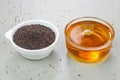 Mustard seed oil in a cup Royalty Free Stock Photo