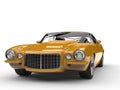 Mustard yellow old school vintage American car - front view Royalty Free Stock Photo