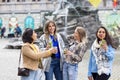 Muti ethnic group of female friends having fun drinking cocktails outdoor in the city in bar restaurant Royalty Free Stock Photo