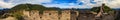 Panoramic view of the Great Wall of China and tourists walking on the wall in the Mutianyu Royalty Free Stock Photo