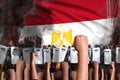 Protest in Egypt - police swat stand against the protestors crowd on flag background, mutiny fighting concept, military 3D