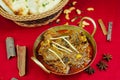 Mutton bhuna korma rogan goshat with bread served in karahi isolated on table top view of indian, pakistani and punjabi spicy food