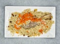 Mutton kabuli pulao served in dish isolated on background top view of indian spices and pakistani food