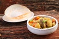 Mutton stew with appam. Royalty Free Stock Photo