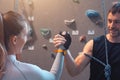 Couple mutual agreement. Support concept. Climbering in boulder gym. Royalty Free Stock Photo