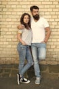 Mutual romance. Sensual woman and bearded man enjoying romance in relationship. Romantic couple in love hugging on brick Royalty Free Stock Photo