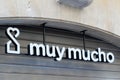 Muy mucho logo and text sign front of spanish brand store of home decoration design