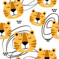 Muzzle of tigers, decorative cute background. Colorful seamless pattern with muzzles of animals Royalty Free Stock Photo