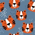 Muzzle of tigers, decorative cute background. Colorful seamless pattern with muzzles of animals Royalty Free Stock Photo