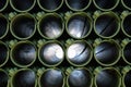 Muzzles barrels of military tank artillery gun on a blue sky background. copy space, selective focus, narrow depth of field.