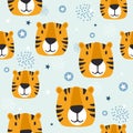 Muzzles of tigers, colorful cute seamless pattern