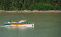 MV Discovery cruising away from Juneau in Alaska