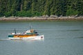 MV Discovery cruising away from Juneau in Alaska