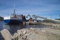 Mv Falknes load gravel at Bakke harbor Royalty Free Stock Photo
