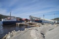 Mv Falknes load gravel at Bakke harbor Royalty Free Stock Photo