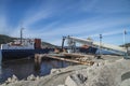 Mv Falknes load gravel at Bakke harbor Royalty Free Stock Photo