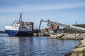 Mv Falknes load gravel at Bakke harbor