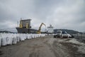 Mv Komet III unloads chemical goods Royalty Free Stock Photo