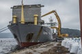 Mv Komet III unloads chemical goods Royalty Free Stock Photo