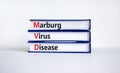 MVD, Masrburg virus disease symbol. Concept words MVD, Masrburg virus disease on books on a beautiful white background. Medical,