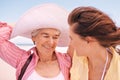 My baby girl is all grown up now. a young woman and her senior mother at the beach. Royalty Free Stock Photo