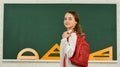 My backpack is just right. Smart schoolgirl. School education. Knowledge day. Girl in school classroom copy space Royalty Free Stock Photo