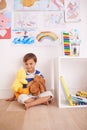 My best bear buddy. Portrait of a cute little boy playing with his stuffed animals in his room. Royalty Free Stock Photo