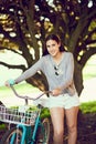 My bicycle gets me places. Portrait of an attractive young woman riding her bicycle outside. Royalty Free Stock Photo