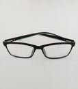black eye glasses at white table Royalty Free Stock Photo