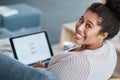 My blog is looking really good. Cropped portrait of an attractive young woman using her laptop on the sofa at home. Royalty Free Stock Photo