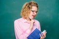 This is my book. new school year. Girl prepare for exams. happy student in glasses at blackboard. report project. back Royalty Free Stock Photo