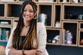 My business. My hard work. My success. Cropped portrait of an attractive young woman standing with her arms crossed in Royalty Free Stock Photo