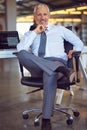 My business is my legacy. Portrait of a mature businessman sitting at his desk in an office. Royalty Free Stock Photo