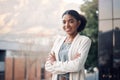 My career is headed to the top. Portrait of a confident young businesswoman standing outside on the balcony of a modern Royalty Free Stock Photo