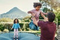 My children mean everything to me. Shot a father playing with his young children at a park outdoors. Royalty Free Stock Photo