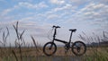 Cycle in the beach with blue sky background