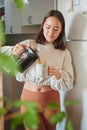 My day doesnt start until the coffee hits. a young woman pouring herself a cup of coffee. Royalty Free Stock Photo