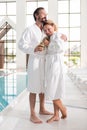 Pleasant nice man hugging his beautiful wife Royalty Free Stock Photo