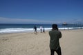 Photo of a Photographer on the beach