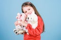 My funny friend. happy childhood. Birthday. little girl playing game in playroom. small girl with soft bear toy. child