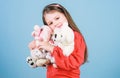 My funny friend. happy childhood. Birthday. little girl playing game in playroom. small girl with soft bear toy. child Royalty Free Stock Photo