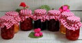 My grandmother`s jam from different berries stylization in glass jars Royalty Free Stock Photo