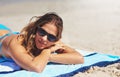 This is my happy place. a young woman lying on the beach on a summers day. Royalty Free Stock Photo