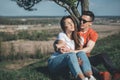 Loving couple resting on grass Royalty Free Stock Photo